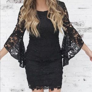 black lace dress with bell sleeves